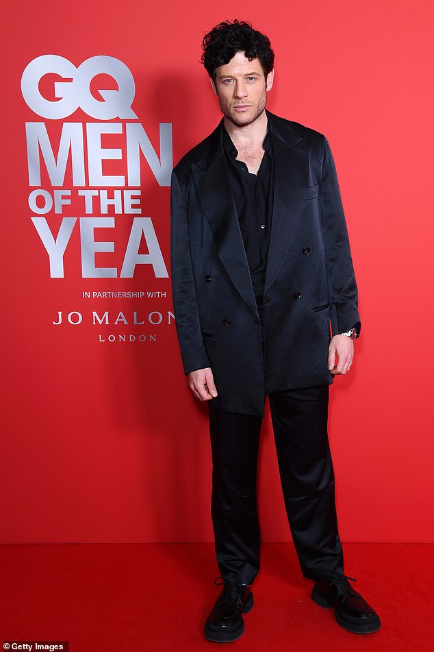 At the GQ Awards, James looked typically dapper in a black silk suit that he wore with a matching shirt.