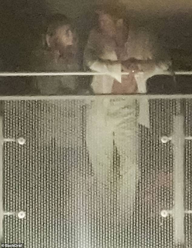 At one point, he placed his arms on the railing while apparently having a serious conversation with Condon's own character, Kate.