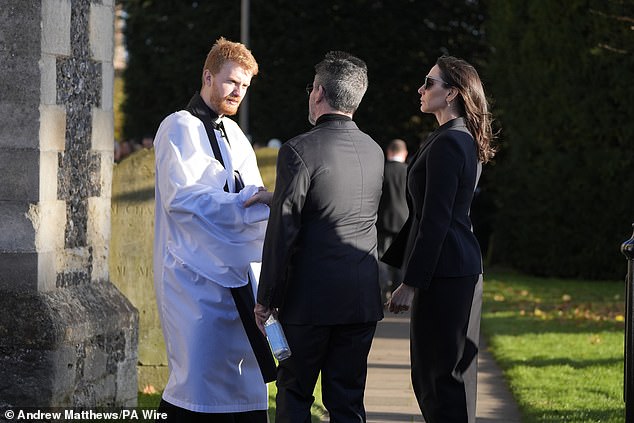 Simon Cowell (centre) and Lauren Silverman (right) after the service