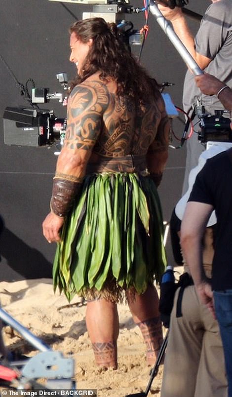 In a first look at the spectacular screen, Johnson - who played Maui in 2016's fully animated Moana - took on the role of the Polynesian demigod as he went shirtless and showed off intricate tattoos while dressed in a leaf skirt.