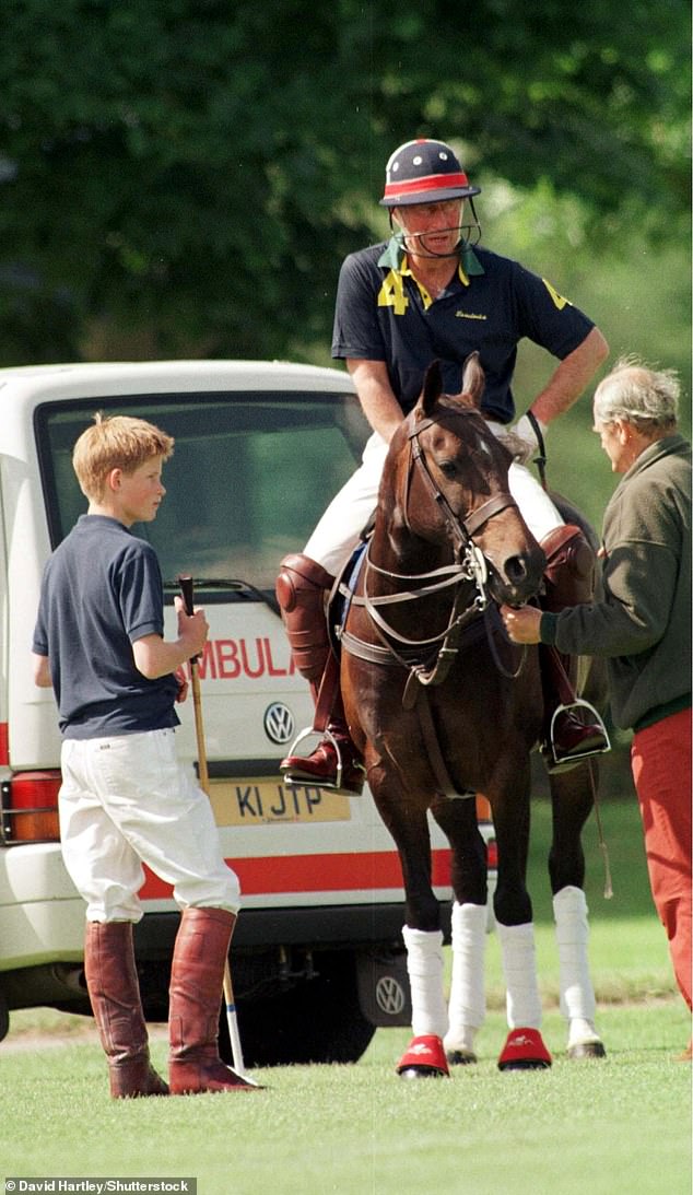 Prince Charles with his son Harry at a polo match in Cirencester Park, Gloucestershire, in 1999