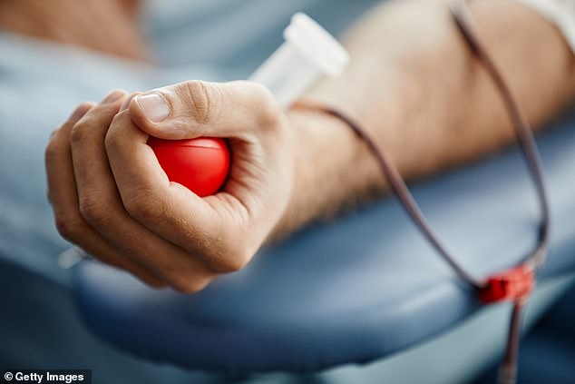 A close-up of a man donating blood. Around 47,500 donors give blood each week and hospitals need around 113,000 donations a month, but the short shelf life means stocks must be constantly renewed.