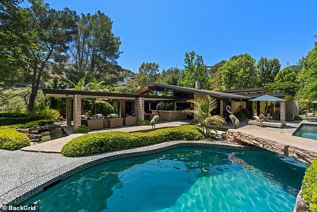 The 36-year-old rapper reportedly purchased the six-bedroom, nine-bathroom home located in the Laurel Canyon neighborhood for a whopping $12.4 million late last month, according to TMZ.