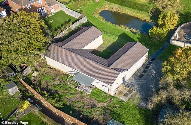 The unauthorized spa pool block at Mrs Ingram-Moore's Bedfordshire home in November 2023 ahead of its demolition