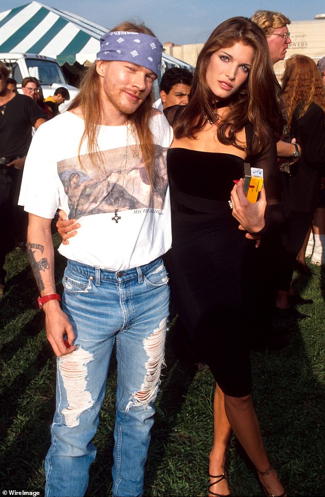 She and Axl were front page news. They began dating in 1991. She appeared in two Guns N' Roses music videos: Don't Cry and November Rain. The couple was reportedly engaged, but separated in February 1993.