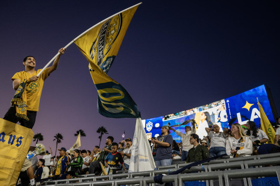 CARSON, CA - SEPTEMBER 14: Los Angeles Galaxy Galaxians group of fans cheer before the match against Los Angeles FC at Dignity Health Sports Park on September 14, 2024 in Carson, California. Los Angeles Galaxy won 4-2. (Photo by Shaun Clark/Getty Images)