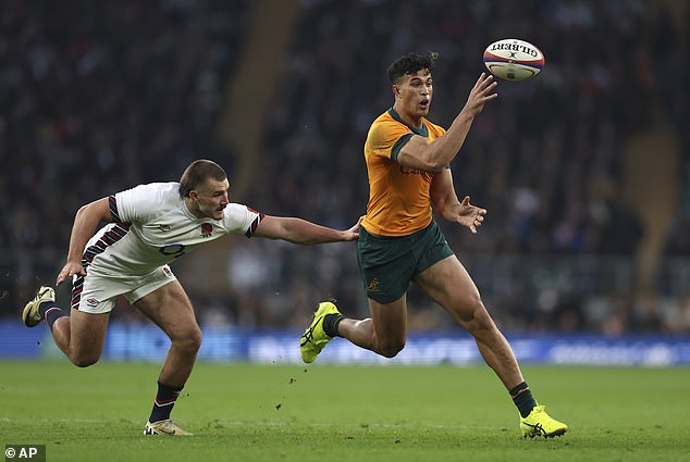 Suaalii made an explosive debut for the Wallabies against England (pictured) after being thrown into the deep end following the NRL season.