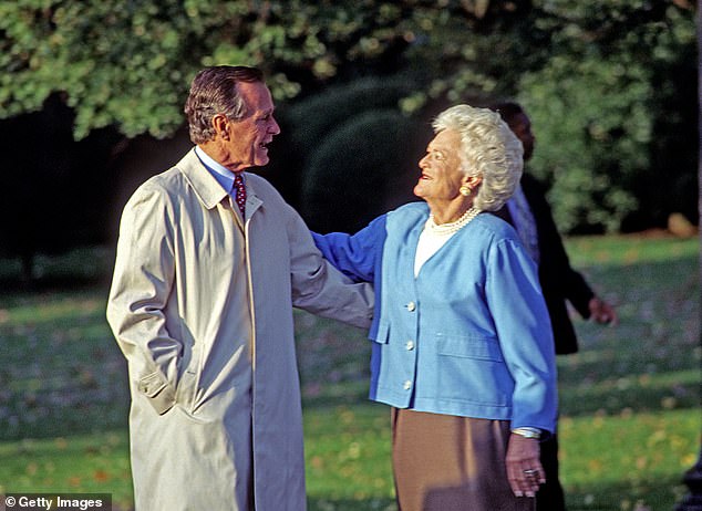 George and Barbara are photographed on the White House lawn in 1992.