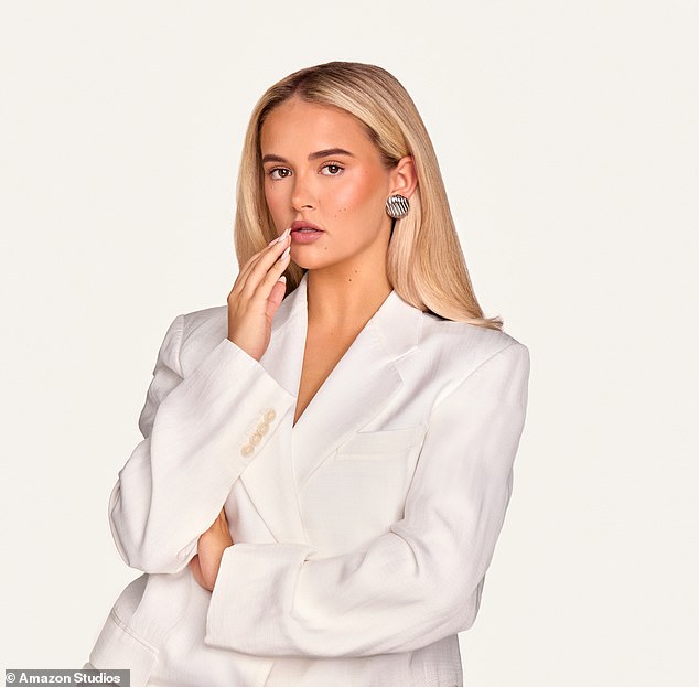 The influencer dazzles in new promotional images of the series wearing a white blazer with gold earrings