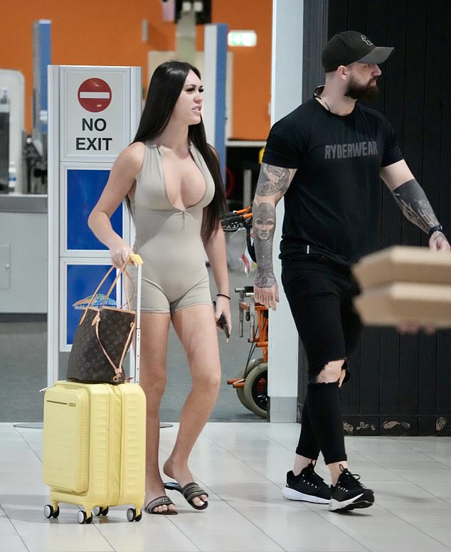 Kay was spotted at the airport wearing a tight beige bodysuit, which she later wore for her studio appearance on Kyle and Jackie O.