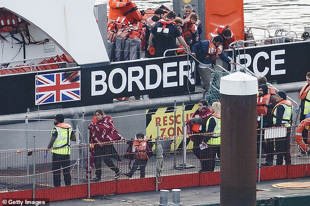 A Border Force vessel carrying around 100 migrants, including several children, arrives at the Port of Dover on October 31, 2024 in Dover, England.