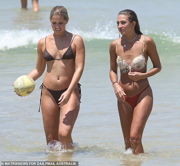 Sydney's hottest day will be Sunday, but the warm weather will continue until midweek (file photo of swimmers in Bondi)