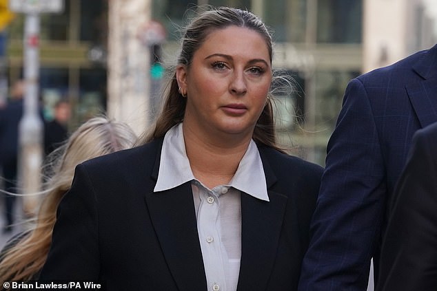 Hand, also known as Nikita Ni Laimhin, is also suing another man, James Lawrence, for assault.