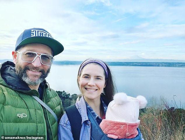 Amanda, her daughter Eureka and her husband Christopher Robinson on a hike together in 2022