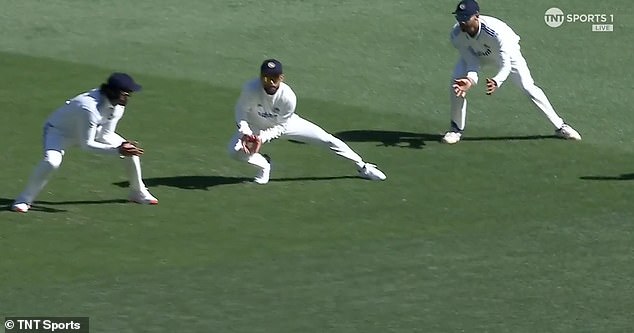 Kohli (center) appeared to make the catch, and his teammates walked away to celebrate.