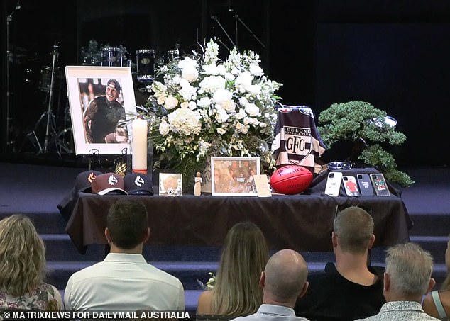 Mr Tippet's coffin was adorned with football memorabilia.