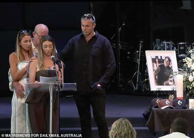 His loved ones are seen speaking to the crowd following Mr. Tippet's death.