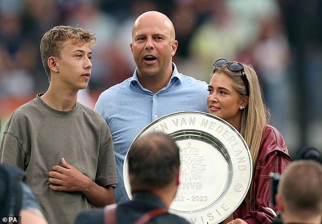 But above all, Slot is a family man (pictured: his son Joep and his daughter Isa).