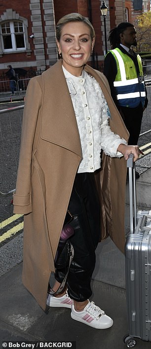 Strictly's Amy Dowden also opted for a tan coat for the evening.