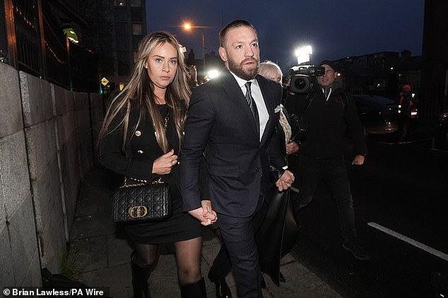 McGregor, pictured with his partner Dee Devlin at the High Court in Dublin this afternoon, faced an accusation of having 