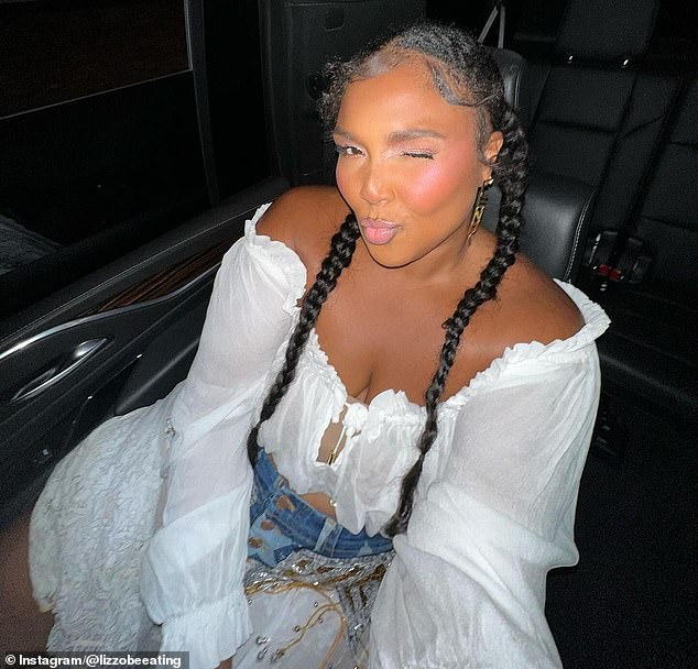 The hitmaker, 36, posted selfies on social media as she sat in her car on the way to a night out wearing a sheer white off-the-shoulder peasant top, with a denim skirt and more sheer white material.