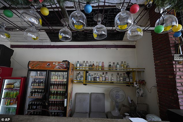 The hostel remains open but is not currently accepting new guests (pictured: Nana's Backpackers bar)