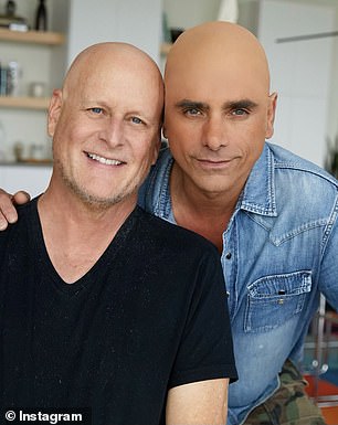 Coulier debuted his bald head in a sweet photo with Stamos, who helped him shave his hair earlier this week, on social media.