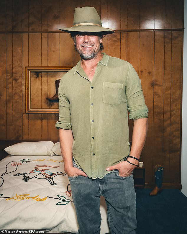 Actor Josh Duhamel was one of many who dressed up for the theme, wearing a cowboy hat.