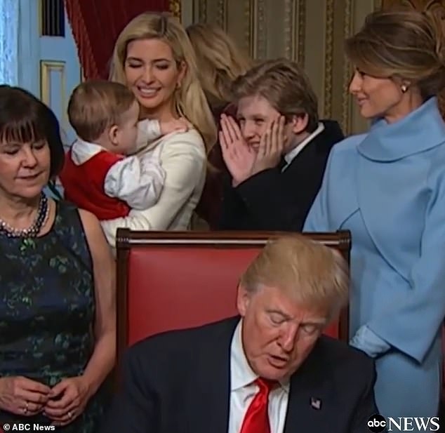 In the endearing clip, Barron starts playing hide-and-seek with Theo, who was dressed in a cute red onesie with a white shirt underneath.