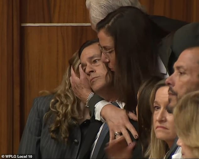 If convicted, Pino faces a minimum of 15 years in prison and a maximum of 30 years in prison. He has denied being guilty of all charges. Pictured: Pino's wife, Cecilia Pino, hugs her husband before corrections staff took him for treatment