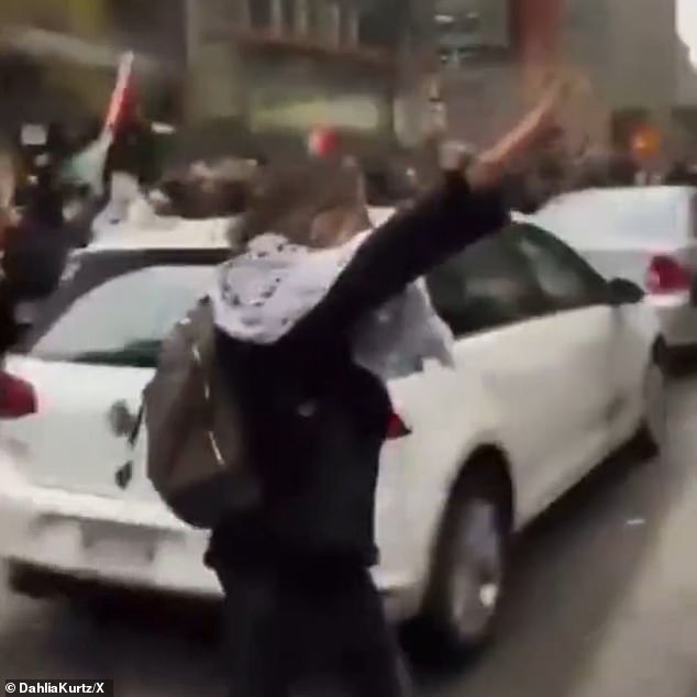 One woman was seen wearing our 'Heil Hitler' salute, which the police appeared to ignore