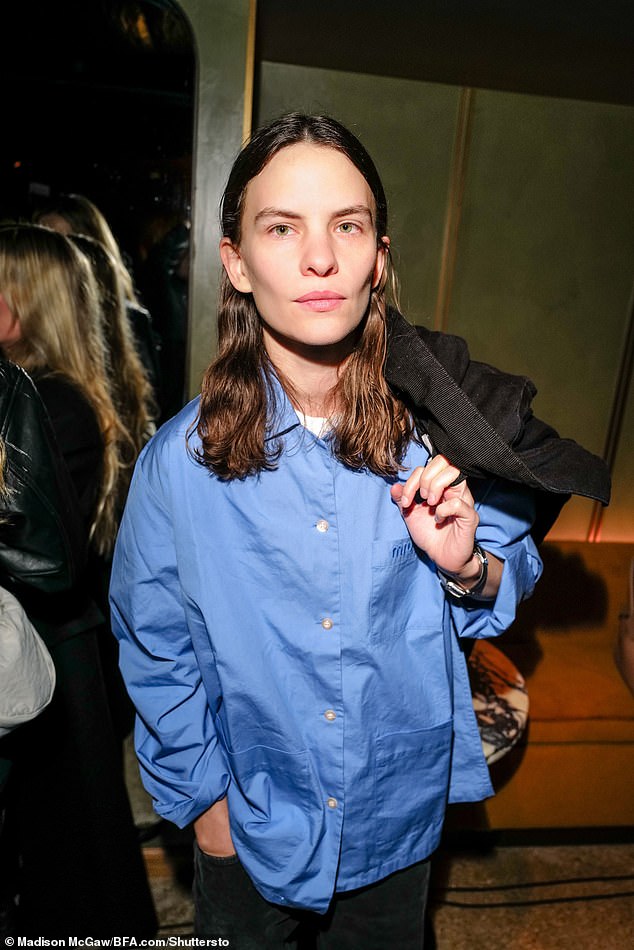 Singer Eliot cut a smart-casual figure in a blue Miu Miu button-down shirt.