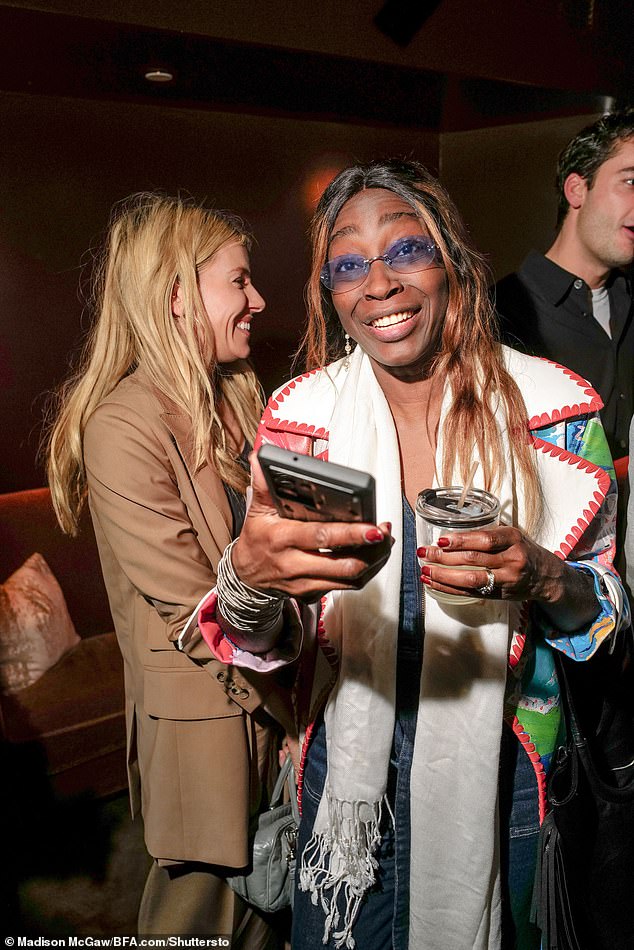 Tina Naija appeared in high spirits while socializing at the event.