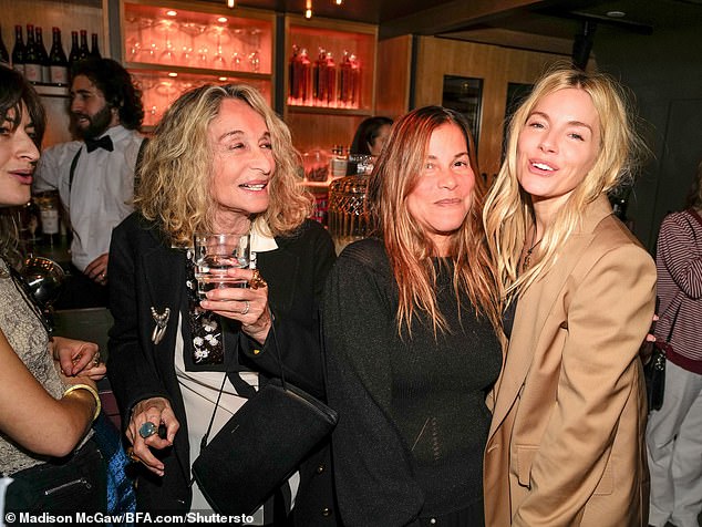 Annabelle Dexter-Jones (second from left) also attended the event and appeared in high spirits as she nonchalantly posed with Sienna and Sarita (second from right).