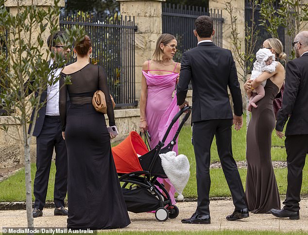 The Perth influencer, 30, was seen cradling her three-month-old daughter Isla as she celebrated Tammy marrying her Love Island Australia partner Matt Zukowski at Chateau Du Soleil.