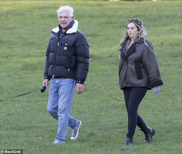 Phillip, who was accompanied by his wife, Stephanie, and two daughters, Molly and Ruby, was seen carrying a wicker coffin topped with a beautiful floral arrangement.