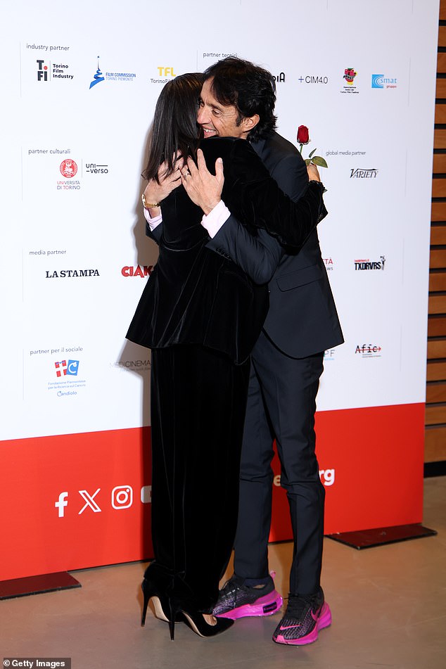 In one snap, the star can be seen sharing a sweet hug with Giulio as he congratulated her.