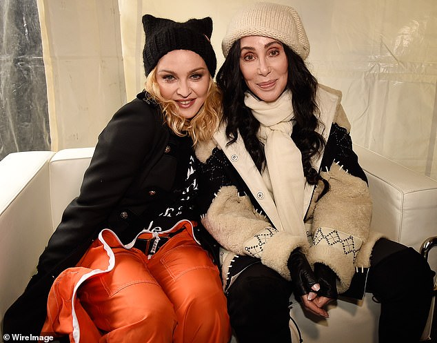 “I never hated her, I just thought she was a b****,” Cher once remarked about Madonna, with whom she is pictured at the 2017 Women's March on Washington, DC