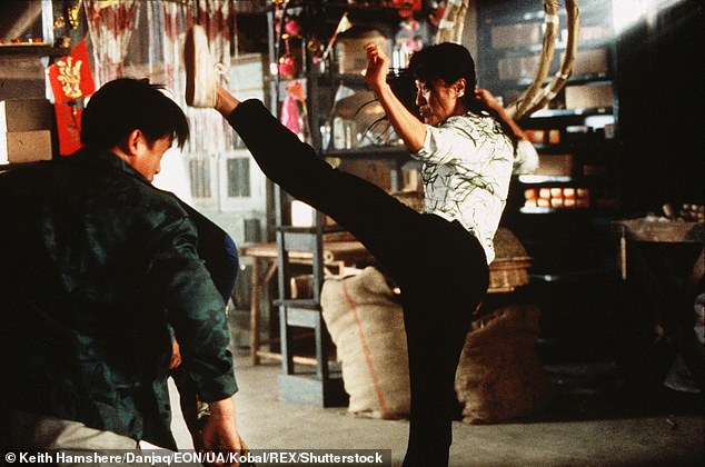 Ms. Yeoh (pictured on set) did many of her own stunts on the set of Tomorrow Never Dies.