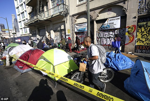 Newsom's lavish purchase drew scrutiny due to the increase in homelessness and vagrancy on California streets during his term, pictured in Los Angeles' Skid Row neighborhood in 2023