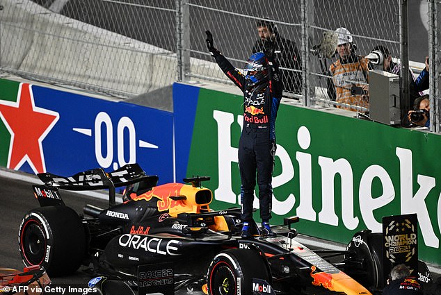 Verstappen gets into his Red Bull after winning his fourth world title