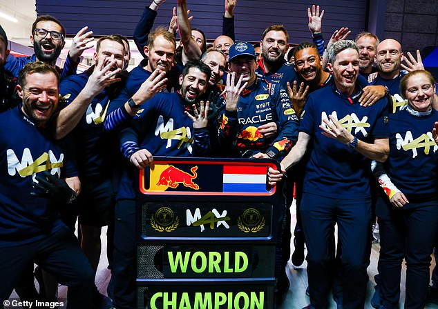 Verstappen pictured celebrating with his Red Bull team after Saturday's race in Nevada.