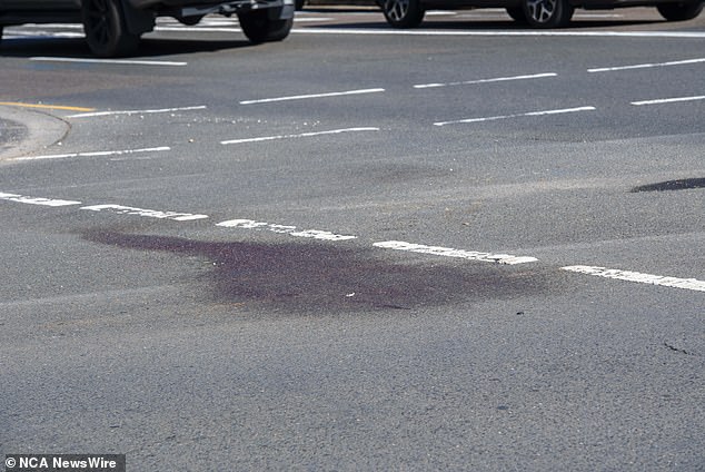 Images from the scene showed bloodstains on the road near the Surry Hills service station.