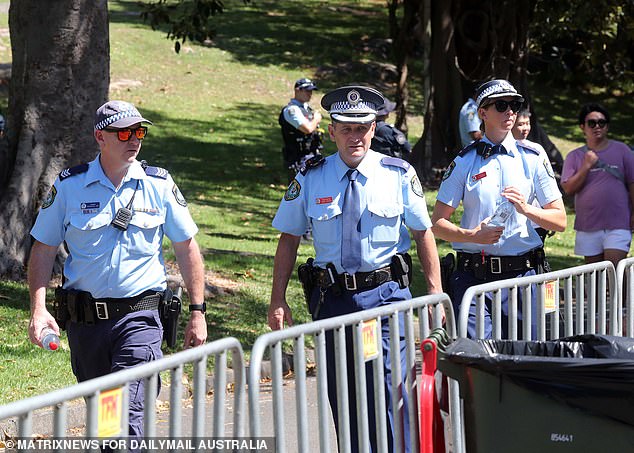 Police patrolled the harbor corridors at Mrs Macquarie Point, at the edge of the gardens.