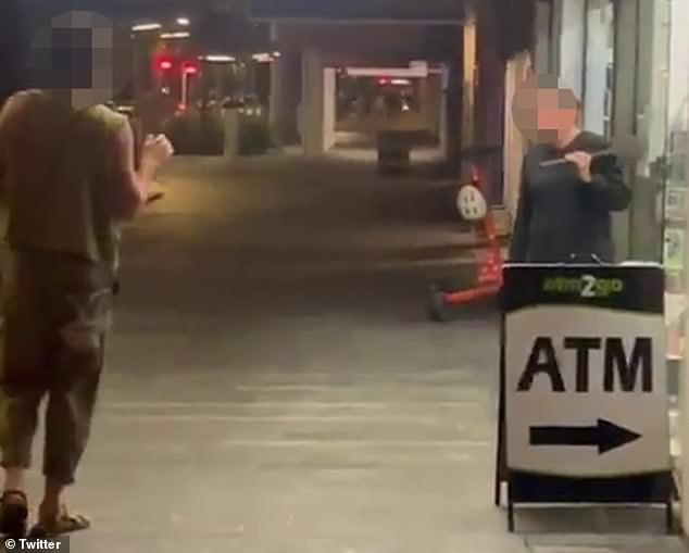 One of the Israeli backpackers (left) questioned the shopkeeper about his language.