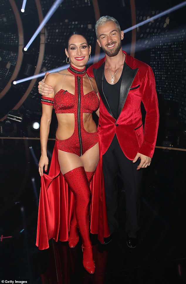 Artem met Nikki on DWTS; They competed together on the show in 2017 and married in 2022; the couple photographed together in 2017