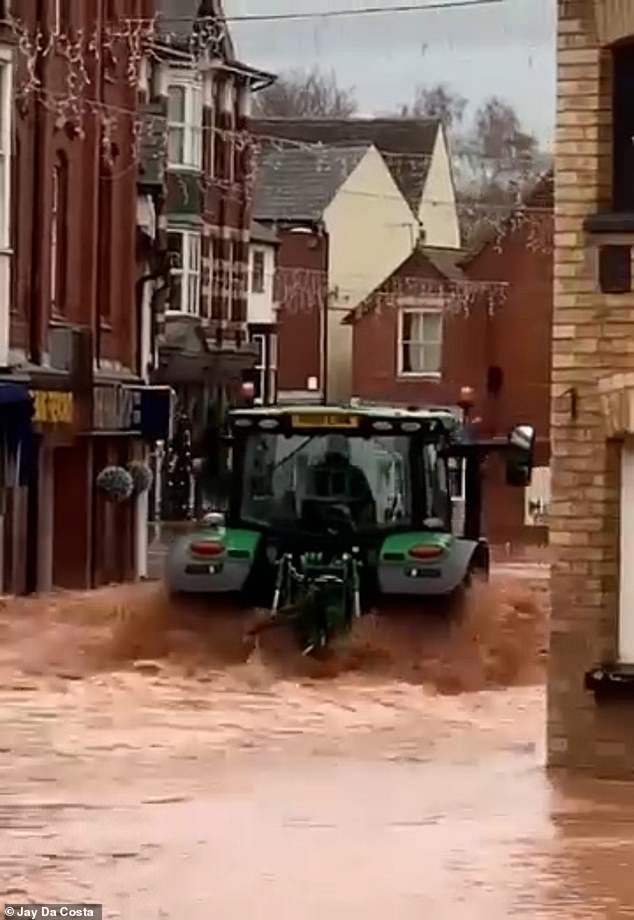 Locals were left furious and labeled the inconsiderate driver 'silly' for causing a torrent of brown water that soaked businesses in Tenbury Wells, Worcestershire.