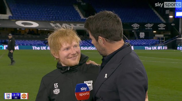 The pop star came over to say hello to Jamie Redknapp while Amorim talked about his team.