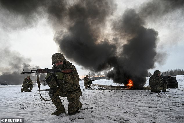 Ukrainian service members conduct military exercises at a training camp. Tragic as it may be, Ukraine faces a very difficult task to regain all the territory it has lost to Russia since 2014.