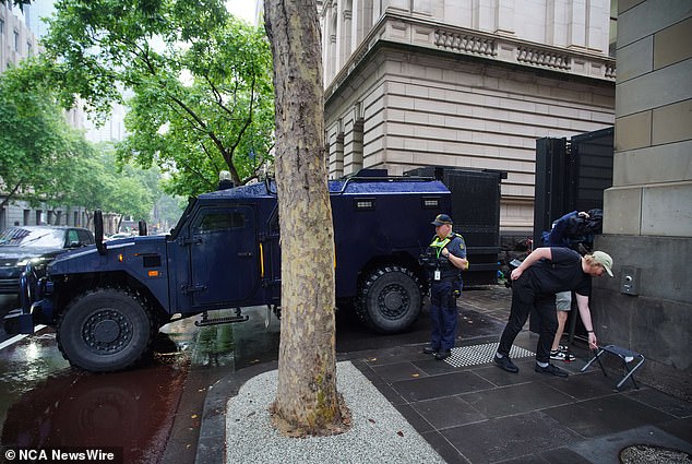 Mokbel could only look at the press equipment placed at the large doors of the Supreme Court alley where the prison trucks leave their chained passengers every day.